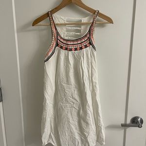 White dress with embroidery and ladder back detail